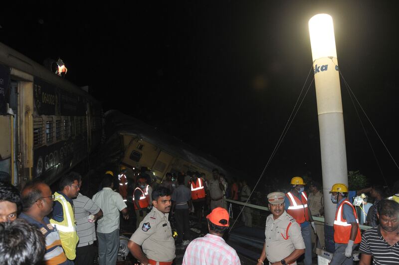 A passenger train slammed into a stationary train, leading to derailment of at least three carriages. AP