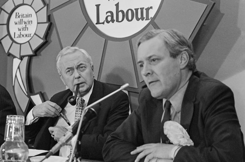 Mr Wilson, left, and Labour politician Tony Benn speaking at a press conference during the 1974 general election campaign