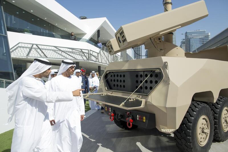 Sheikh Mohammed looks at a Nimr military vehicle. Ryan Carter / Crown Prince Court - Abu Dhabi