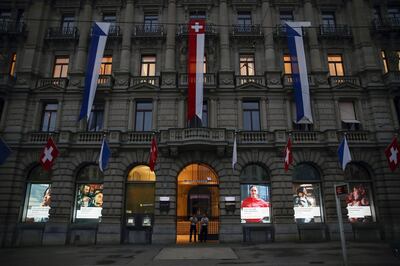Security stands at the entrance to Credit Suisse Group AG's headquarters in Zurich, Switzerland, on Wednesday, Jul. 31, 2019.Photographer: Stefan Wermuth/Bloomberg