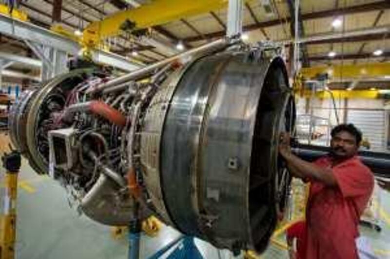 United Arab Emirates - Abu Dhabi - Jun 26 - 2008:  Jacob Gerold Joseph, from India, check a turbine in an hangar of ADNAT, Abu Dhabi Aircraft Technology.( Jaime Puebla / The National ) *** Local Caption ***  JP103 - ADAT.jpgBZ08-ADAT3.jpg