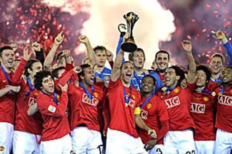 The Manchester United captain Rio Ferdinand, centre, lifts the Club World Cup in Japan in 2008.