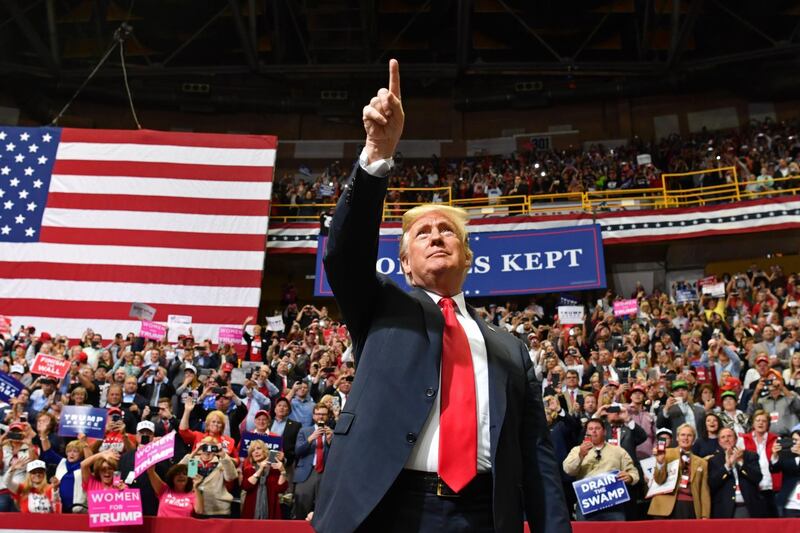TOPSHOT - US President Donald Trump arrives for a "Make America Great Again" campaign rally at McKenzie Arena, in Chattanooga, Tennessee on November 4, 2018.  / AFP / Nicholas Kamm
