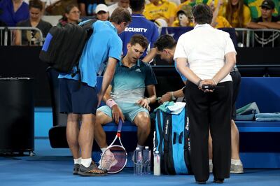 MELBOURNE, AUSTRALIA - JANUARY 17:  Dominic Thiem of Austria receives treatment in his second round match against Alexei Popyrin of Australia during day four of the 2019 Australian Open at Melbourne Park on January 17, 2019 in Melbourne, Australia.  (Photo by Mark Kolbe/Getty Images)