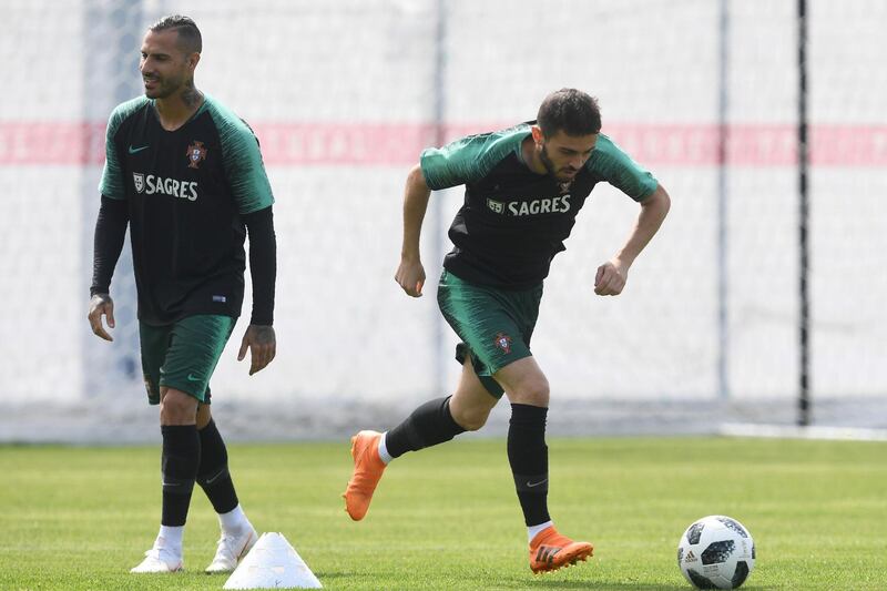 Portugal's midfielder Bernado Silva, right, and forward Ricardo Quaresma attend a training session at their base camp in Kratovo, Moscow, Russia, on June 12, 2018. Francisco Leong / AFP