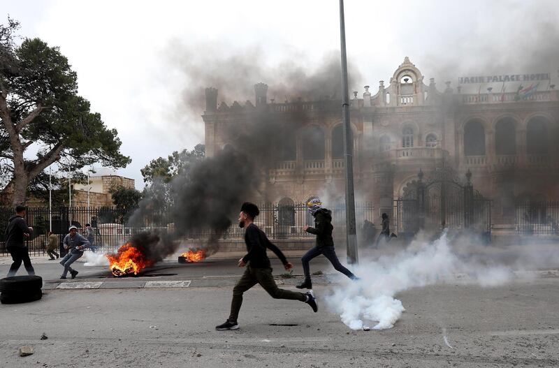 Palestinians clash with Israeli security forces following a protest in the West Bank city of Bethlehem, 29 January 2020. EPA