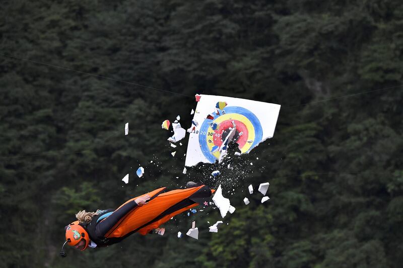A wingsuit flyer hits the target during Wingsuit Flying World Championship in Zhangjiajie, Hunan province in China. Picture by China Daily via Reuters