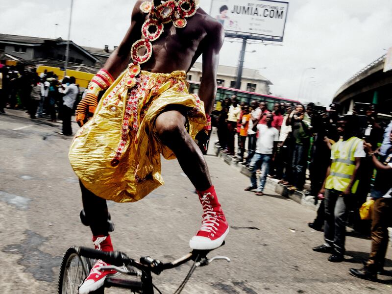 Nigeria. Lagos. 2013. During the Easter Carnival parade.

Images for use only in connection with direct publicity for the book Magnum Atlas published by Prestel available from October 2017. These images are for one time non-exclusive use only and must not be electronically stored in an media asset retrieval database
·         Up to 3 images for print use and 5 online only can be used without licence fees. Please contact Magnum to use on any front covers.
·         Images must be credited and captioned as outlined by Magnum Photos
·         Images must not be reproduced online at more than 1000 pixels without permission from Magnum Photos
·         Images must not be overlaid with text, cropped or altered in anyway without permission from Magnum Photos.
·         This licence is applicable only until 31st December 2017
