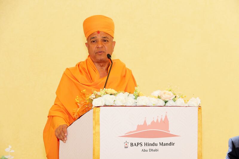 Swami Brahmaviharidas, head of international relations for Baps, speaking during a press conference in Abu Dhabi. Pawan Singh / The National