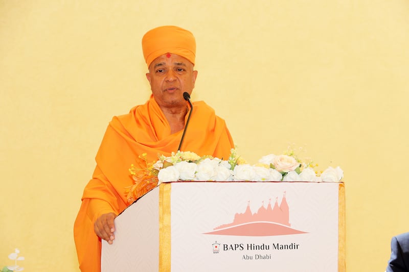 Swami Brahmaviharidas, head of international relations for Baps, speaking during a press conference in Abu Dhabi. Pawan Singh / The National