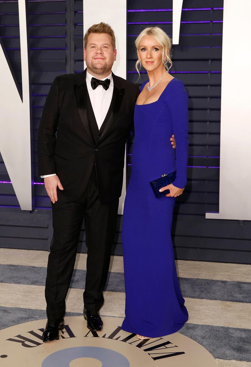 James Corden and Julia Carey arrive at the 2019 Vanity Fair Oscar Party. Reuters