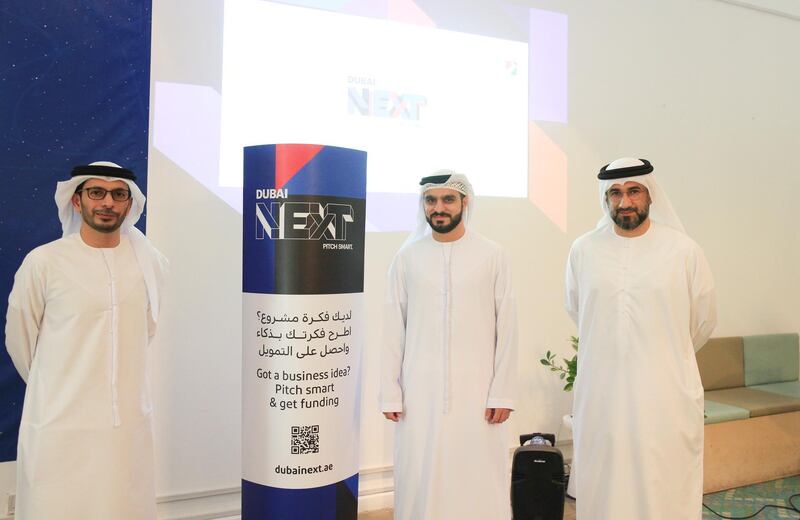 Abdul Baset Al Janahi (right), chief executive of Dubai SME, and Saeed Al Marri (left), deputy chief executive of Dubai SME, with Yousuf Al Arif, founder of start-up Padel 26. Courtesy Dubai SME