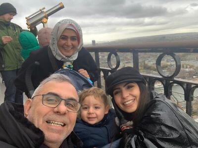 Sami, his wife Sana, his daughter Heba and Heba's two-year-old son, during a family trip to Paris in December 2019. Courtesy Courtesy Adeeb Sami. 
