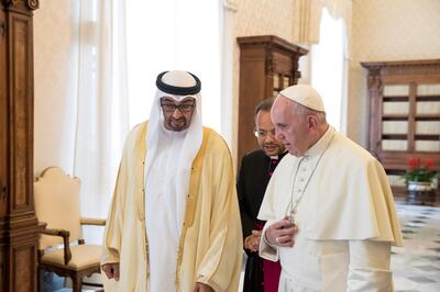 VATICAN CITY, VATICAN - September 15, 2016: HH Sheikh Mohamed bin Zayed Al Nahyan, Crown Prince of Abu Dhabi and Deputy Supreme Commander of the UAE Armed Forces (L), meets with His Holiness Pope Francis, Bishop of Rome (R), in the Papal Library at the Apostolic Palace. 
( Ryan Carter / Crown Prince Court - Abu Dhabi ) *** Local Caption ***  20160915RC_C164701.jpg