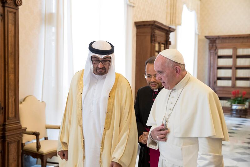 VATICAN CITY, VATICAN - September 15, 2016: HH Sheikh Mohamed bin Zayed Al Nahyan, Crown Prince of Abu Dhabi and Deputy Supreme Commander of the UAE Armed Forces (L), meets with His Holiness Pope Francis, Bishop of Rome (R), in the Papal Library at the Apostolic Palace. 
( Ryan Carter / Crown Prince Court - Abu Dhabi ) *** Local Caption ***  20160915RC_C164701.jpg