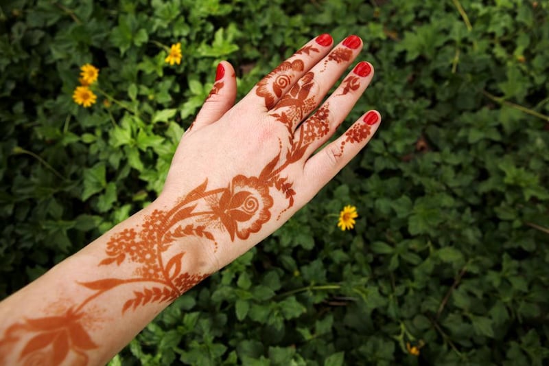Henna was used as an art form in Asia, then a hair dye in Ancient Egypt and now is a part of Eid celebrations. Christopher Pike / The National 