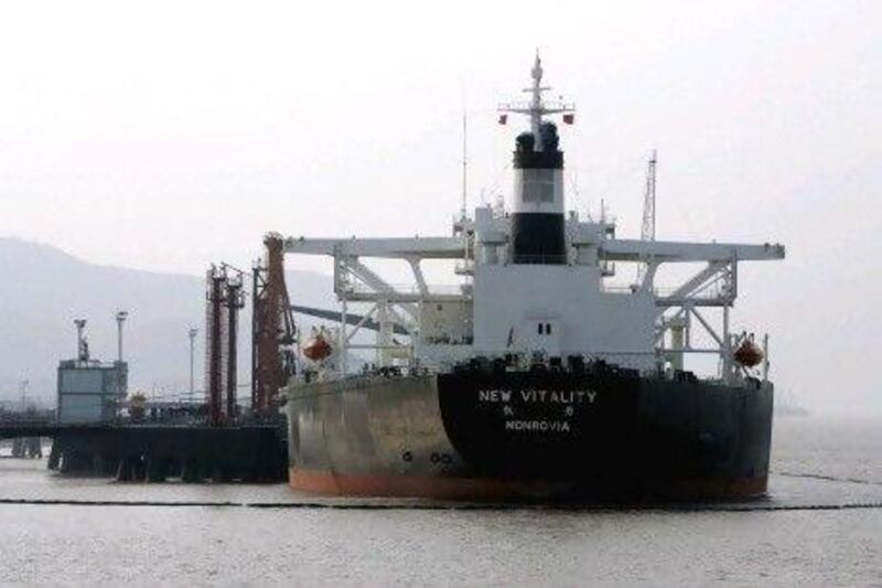 An oil tanker is anchored offshore on April 15, 2006 near Zhoushan, China. China's surging appetite for energy is rattling Washington and aggravating an already intense rivalry with neighboring Japan over access to oil and gas supplies, adding to tensions in an already volatile region. (AP Photo/Eugene Hoshiko)