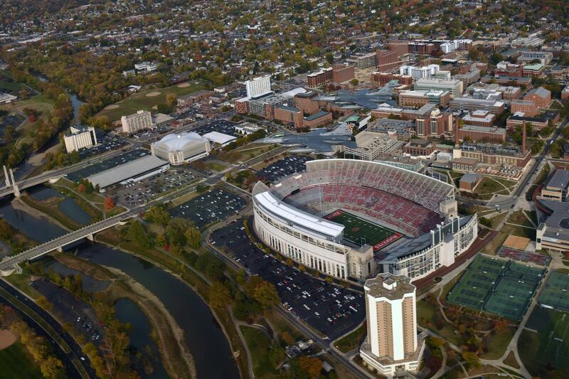 2B0A5JA Two U.S. Air Force F-16 Fighting Falcon fighter jets, assigned to the 180th Fighter Wing, fly over the Ohio State University football stadium during a routine training mission October 24, 2015 in Columbus, Ohio.