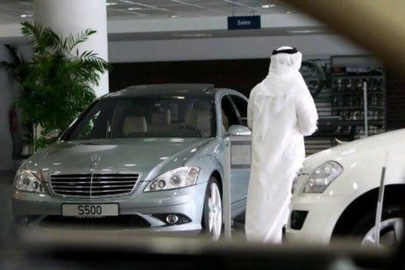 A Mercedes-Benz on sale in Marina Mall, Abu Dhabi. The young are increasingly being tempted by easy credit to get themselves in debt.
