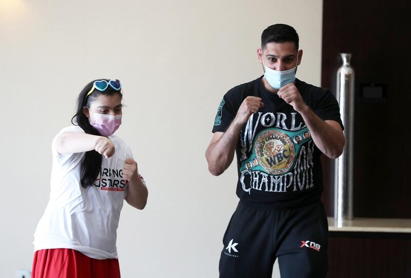 DUBAI, UNITED ARAB EMIRATES , December 28 – 2020 :- Amir Khan, British professional boxer posing for the photo with Anoushka Tandon during the Rising Stars (people with determination) event held at the Fairmont The Palm hotel on Palm Jumeirah in Dubai. ( Pawan Singh / The National ) For News/Online/Instagram. Story by Kelly