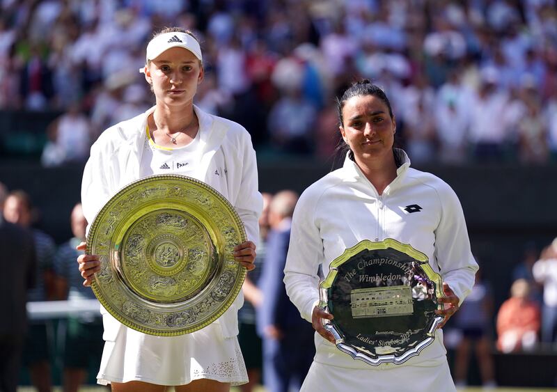 Wimbledon champion Elena Rybakina alongside Ons Jabeur. PA