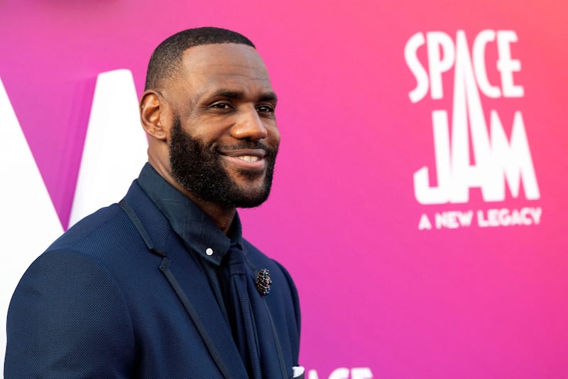 Basketball player LeBron James has earned $330 million in player salaries and another $700m off the court from endorsements, merchandising, licensing and his media business. Photo: AFP