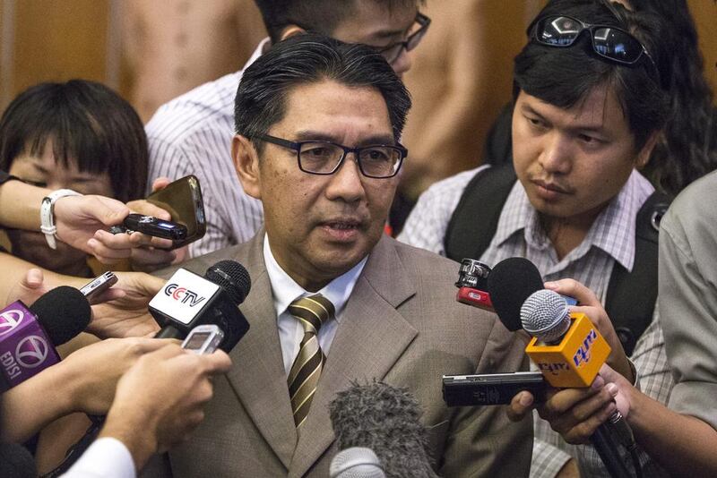 Malaysia's Civil Aviation Department director general Azharuddin Abdul Rahman speaks to members of the media in Kuala Lumpur. Malaysia and UK's Inmarsat satellite data company released raw communications data on 27 May that they say confirms that Malaysia Airlines flight MH370 crashed into the southern Indian Ocean.  Ahmad Yusni/EPA