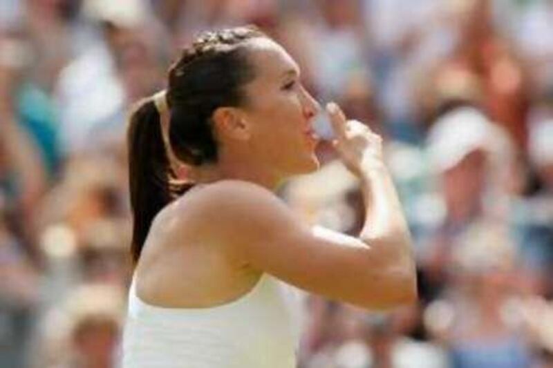 Jelena Jankovic of Serbia blows kisses after defeating Caroline Wozniacki of Denmark in their match at the Wimbledon tennis championships in London June 28, 2008.    REUTERS/Kieran Doherty   (BRITAIN)
Picture Supplied by Action Images *** Local Caption *** 2008-06-28T145058Z_01_WIM056_RTRIDSP_3_TENNIS-WIMBLEDON.jpg