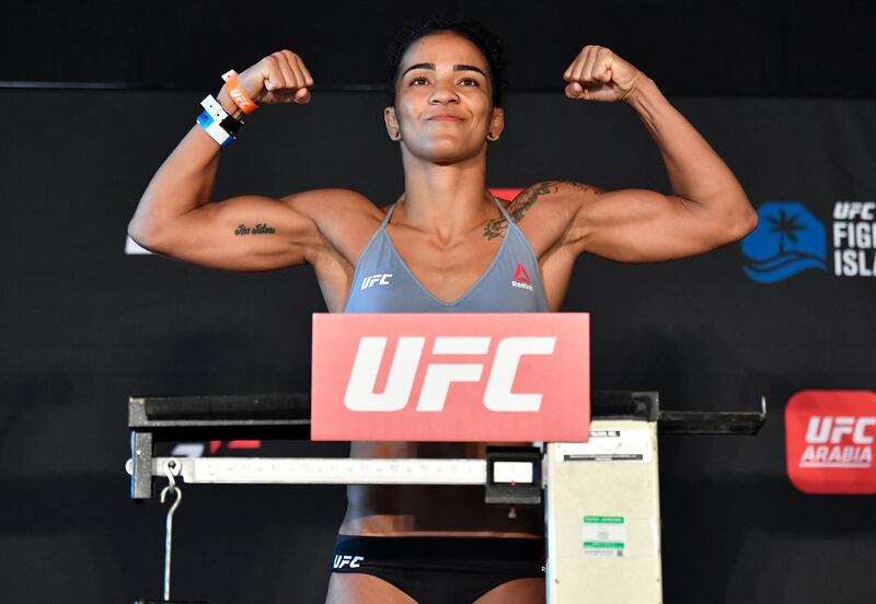 ABU DHABI, UNITED ARAB EMIRATES - JANUARY 19: Viviane Araujo of Brazil poses on the scale during the UFC weigh-in at Etihad Arena on UFC Fight Island on January 19, 2021 in Abu Dhabi, United Arab Emirates. (Photo by Jeff Bottari/Zuffa LLC) *** Local Caption *** ABU DHABI, UNITED ARAB EMIRATES - JANUARY 19: Viviane Araujo of Brazil poses on the scale during the UFC weigh-in at Etihad Arena on UFC Fight Island on January 19, 2021 in Abu Dhabi, United Arab Emirates. (Photo by Jeff Bottari/Zuffa LLC)