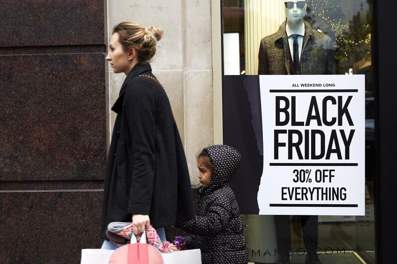 A shop front displays its Black Friday sales in Oxford Circus in London, England.  Shoppers Look For Bargains On Black Friday. Getty Images