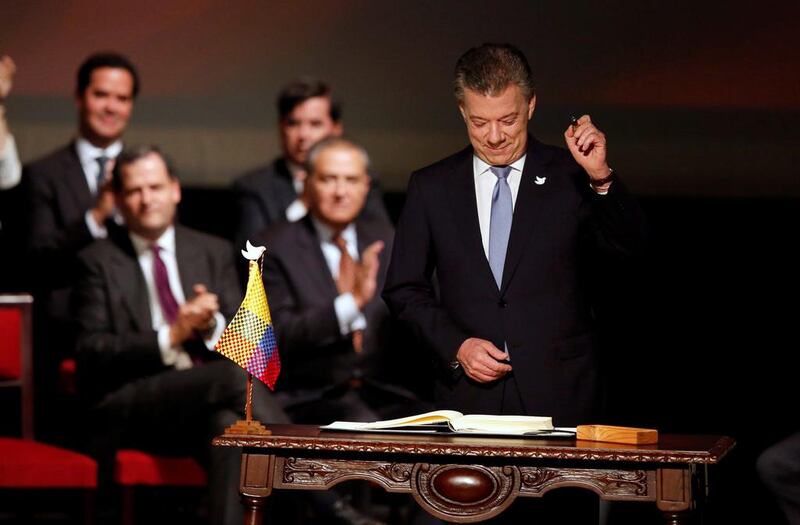 Colombian president Juan Manuel Santos prepares to sign a new peace accord in Bogota on November 24, 2016. Jaime Saldarriaga/Reuters