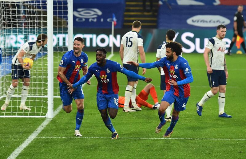 Crystal Palace's Jeffrey Schlupp, centre, celebrates after scoring the equaliser to earn his side a 1-1 draw with Tottenham Hotspur at Selhurst Park on Sunday, December 13. EPA