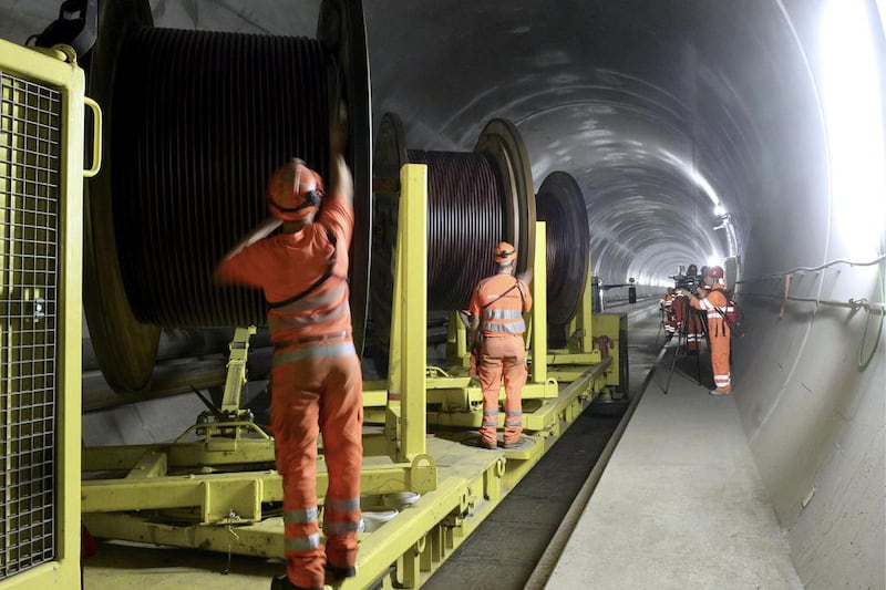 Workers between Biasca and Amsteg, Switzerland leg of the tunnel in 2013. Karl Mathis / Keystone via AP file)