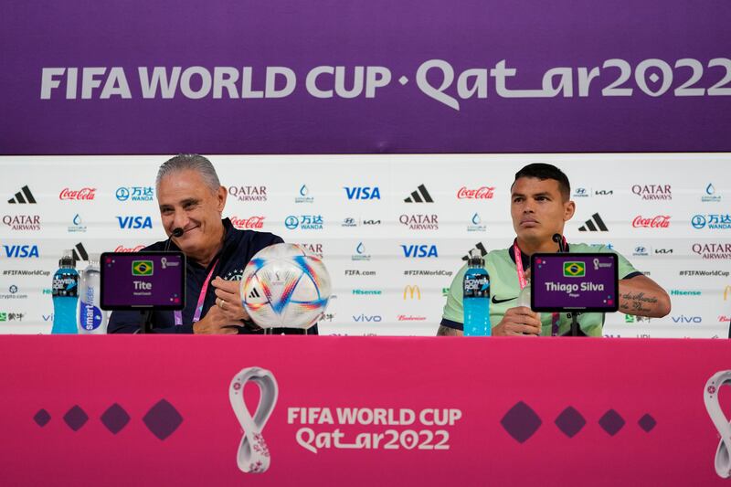 Brazil head coach Tite, left, and Thiago Silva attend a press conference on Wednesday, November 23, 2022. AP