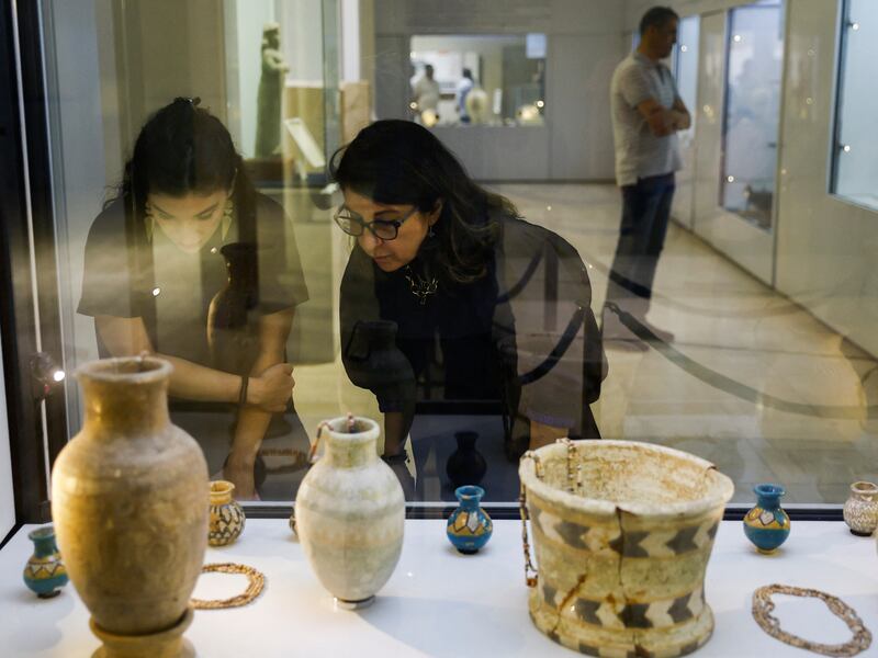 Visitors tour Iraq's National museum in Baghdad. It has reopened to the public after a three-year closure due to the spread of Covid-19 and local unrest. 