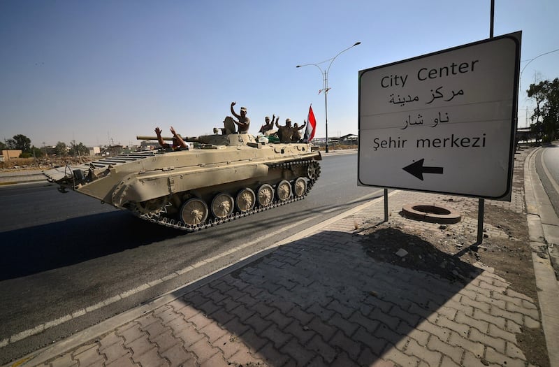 A convoy of armoured vehicles from Iraq's counter-terrorism forces seized the provincial government headquarters in the centre of Kirkuk, less than a day after the operation began. Reuters