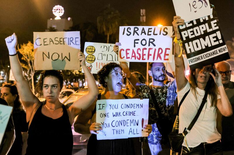 The protest was held near the headquarters of the Israeli Defence Ministry in Tel Aviv. AFP