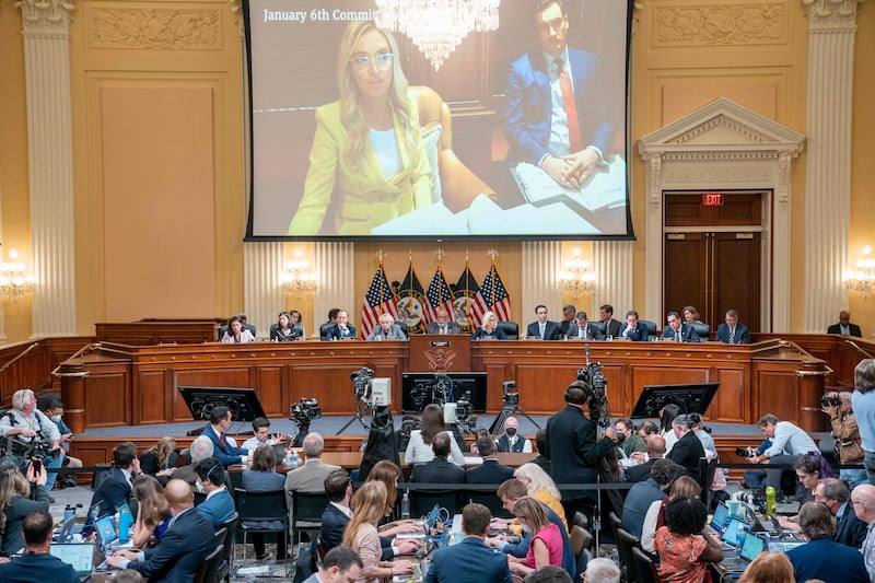 A video showing former White House press secretary Kayleigh McEnany is displayed as Ms Hutchinson gives evidence. AFP