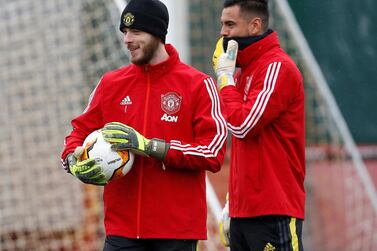 Soccer Football - Europa League - Manchester United Training - Aon Training Complex, Manchester, Britain - February 19, 2020 Manchester United's David de Gea and Sergio Romero during training Action Images via Reuters/Craig Brough