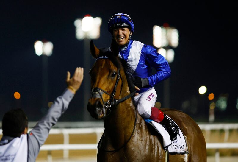 Frankie Dettori celebrates after winning the $5 million Dubai Turf. Reuters