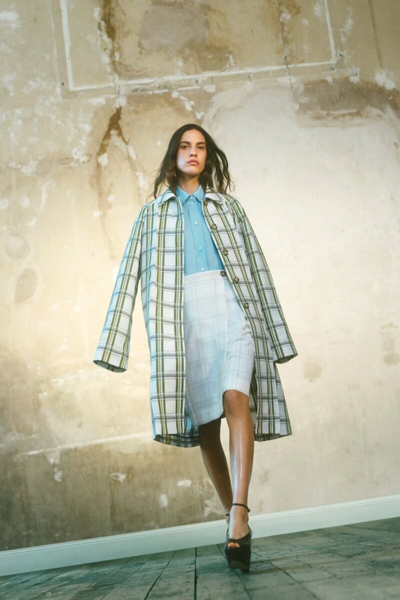 Masculine checks are given an upgrade with the new knee length skirt at Victoria Beckham
