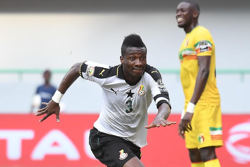 (FILES) In this file photo taken on January 21, 2017 Ghana's forward Asamoah Gyan celebrates after scoring a goal during the 2017 Africa Cup of Nations group D football match between Ghana and Mali in Port-Gentil. Asamoah Gyan was included in Ghana's squad for the Africa Cup Nations on June 10, 2019 after reverting his decision to retire from international duty having lost the captaincy. / AFP / Justin TALLIS
