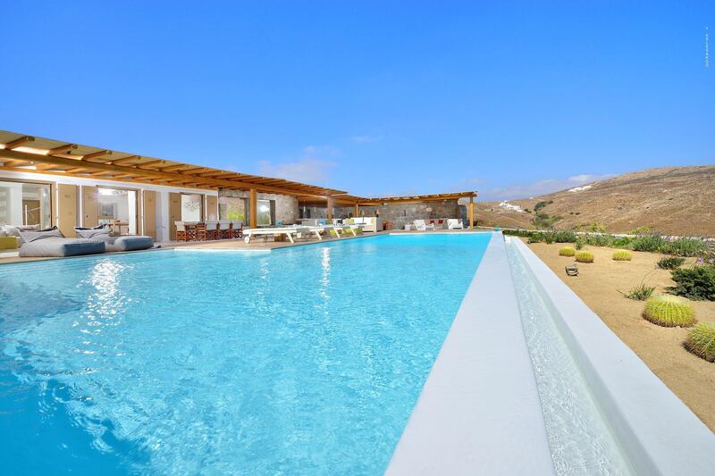 The swimming pool at Residence MK04163 listed by Algean Property, in Elia, Mykonos  