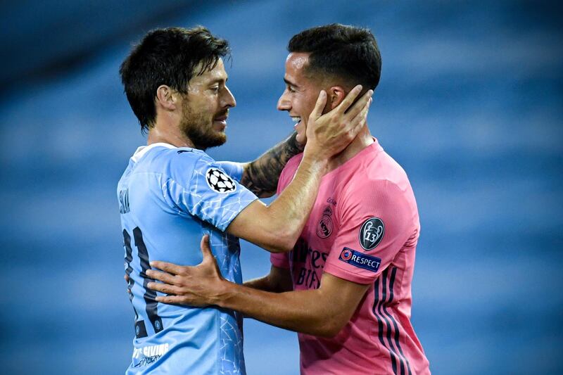 Manchester City's David Silva  and Real Madrid's Lucas Vazquez . EPA