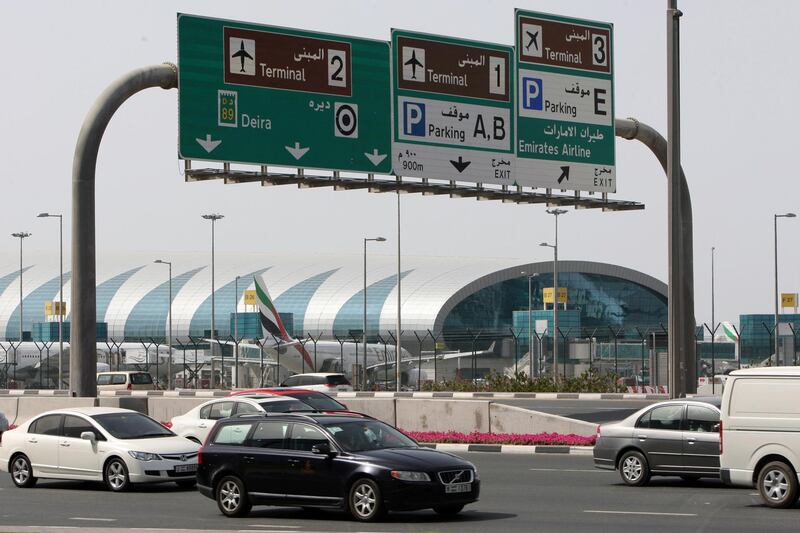 DUBAI, UNITED ARAB EMIRATES - APRIL 27:  Signs on Airport road indicating directions for the three airport terminals are seen in Dubai on April 27, 2010. The Dubai International Terminal 1 Metro Station which is located nearby, is one of seven new stations set to open on Friday, April 30, 2010.  (Randi Sokoloff / The National)  For A&L Oasis-Metro/and or Stock