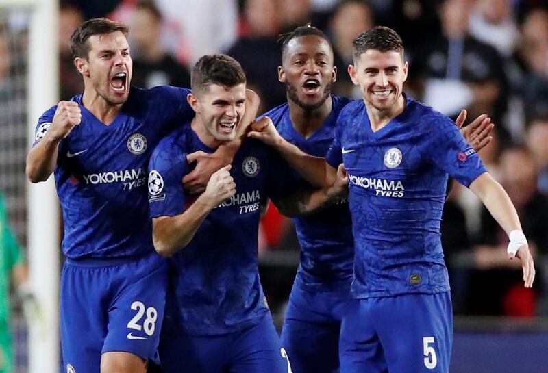 Chelsea's Christian Pulisic, second left, celebrates scoring their second goal. Reuters