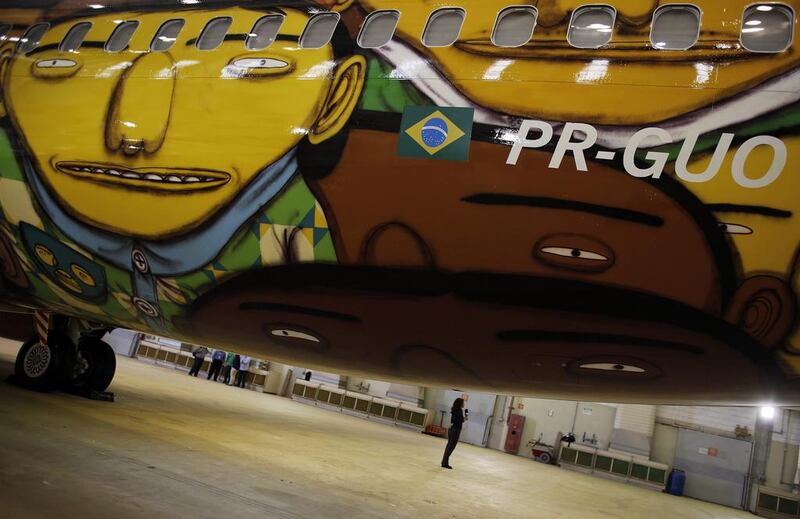 A look at the Brazil World Cup plane, the design of which was inspired by Brazil's popular street-art styles. Nacho Doce / Reuters / May 27, 2014