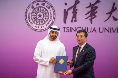 Sheikh Mohamed collects his honorary professor award from Tsinghua University