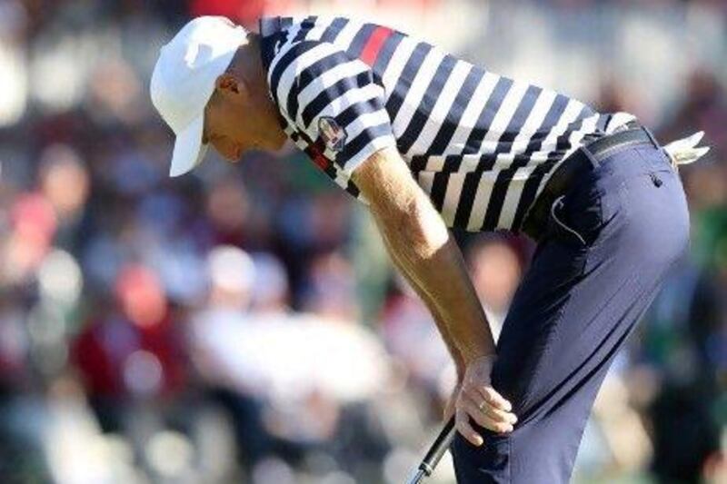Jim Furyk of the USA reacts to a missed par putt on the 18th green during the Singles Matches.