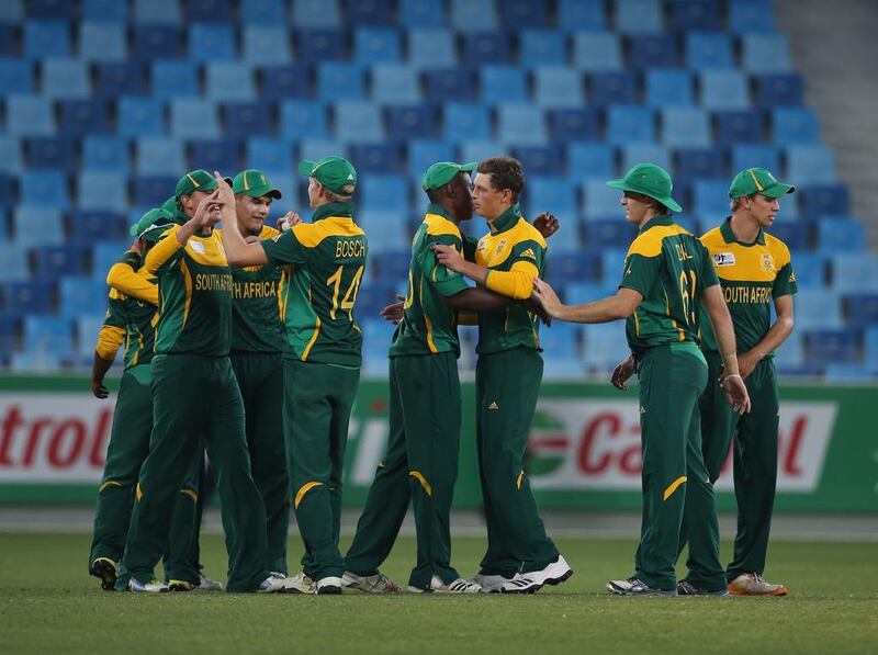 South Africa players celebrate after winning over Australia and securing passage to the ICC Under 19 World Cup final on Wednesday, February 26, 2014. Francois Nel / Getty Images